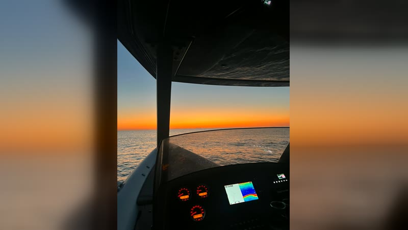 On board the RIBCO Blade 30 — at the helm at golden hour