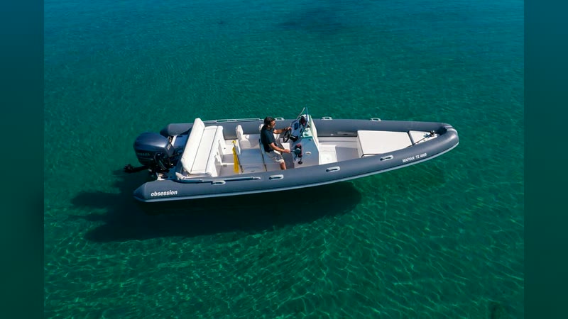 Obsession 7.40 RIB with guests aboard