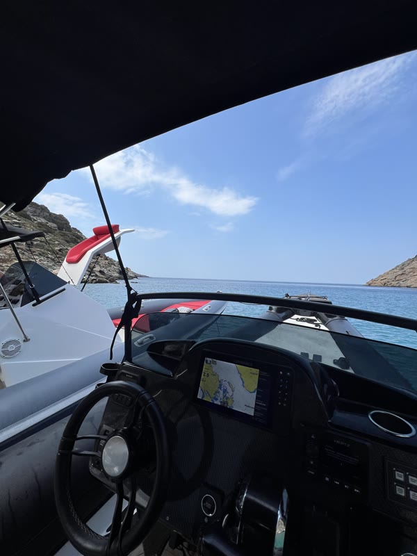 Cockpit view from under the bimini, open sea ahead
