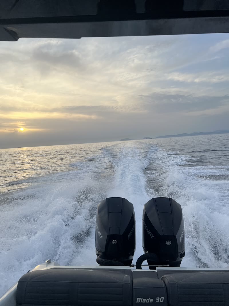 Sunset cruise — golden-hour wake behind the RIBCO Blade 30